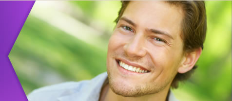 Guy Smiling with green background